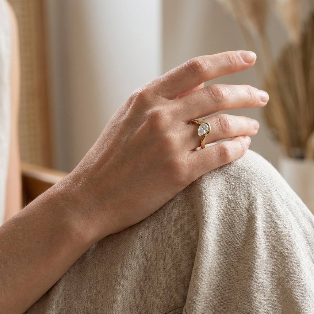 Contemporary_Waved_Pear_Uneven_Diamond_Engagement_Ring_yellow_gold.jpg