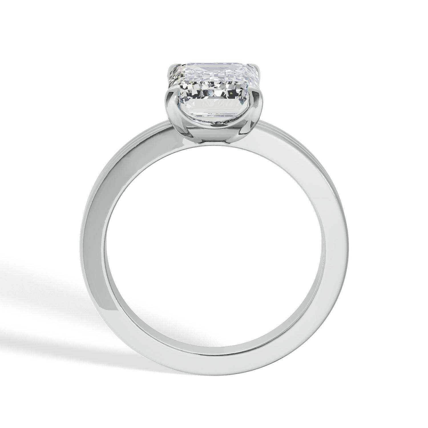 Emerald-Cut_Solitaire_Diamond_Engagement_Ring_with_Triple-Rail_Shank_angle_view_platinum.jpg