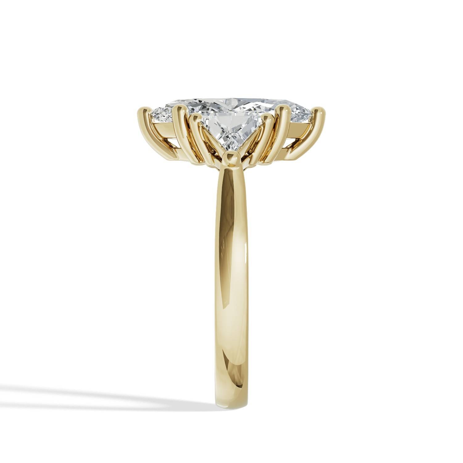 Marquise_Trilogy_Diamond_Engagement_Ring_with_Triangle_Sides_side_view_yellow_gold