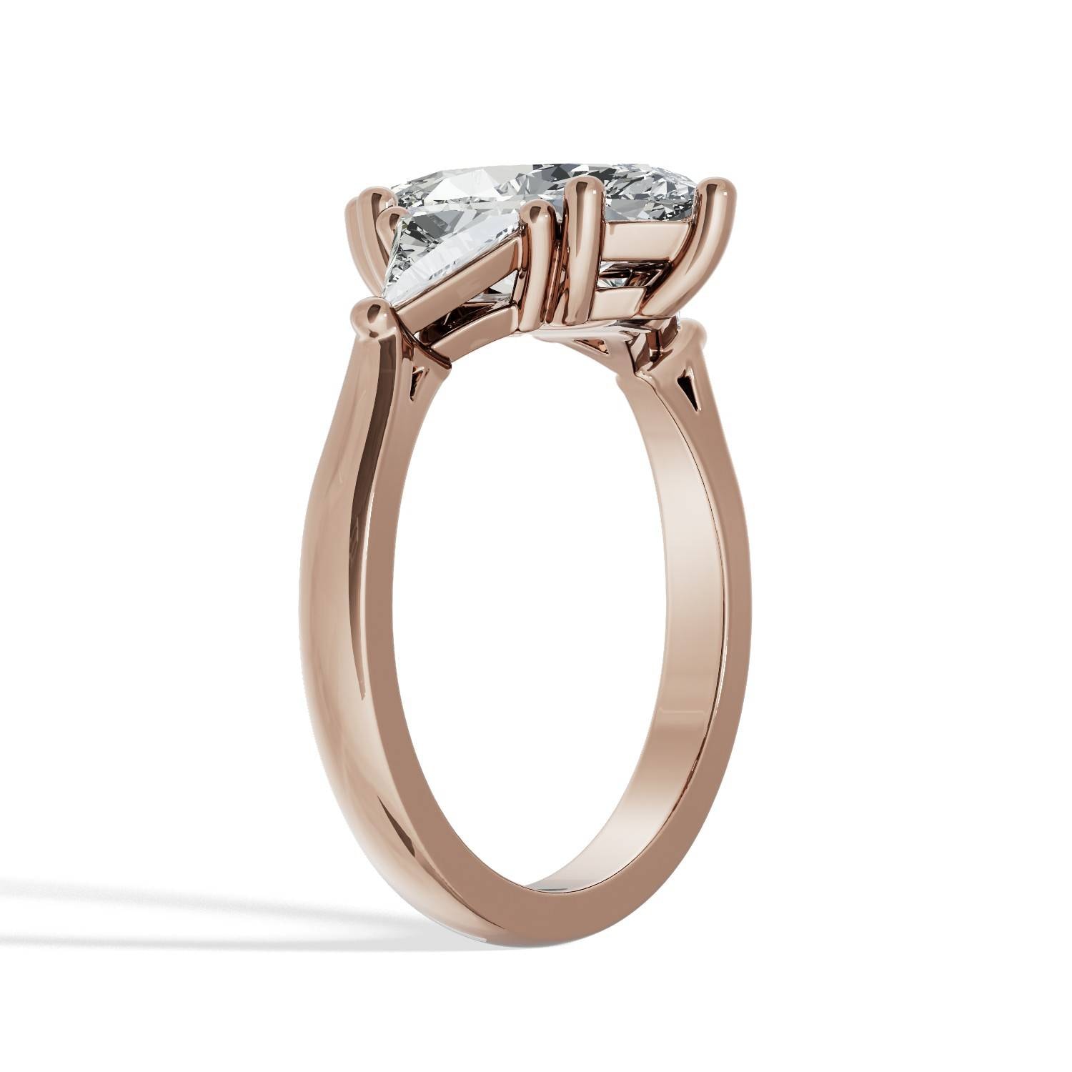 Marquise_Trilogy_Diamond_Engagement_Ring_with_Triangle_Sides_hero_rose_gold