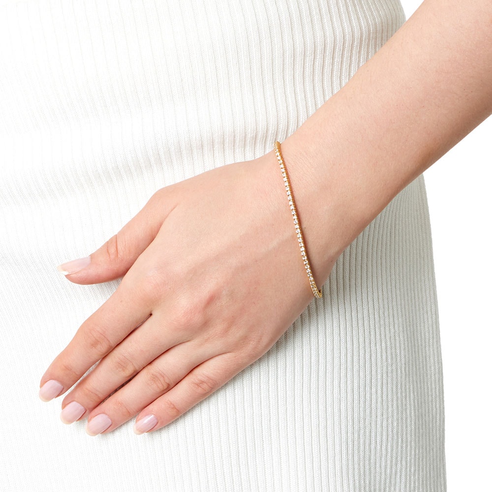 2 Carat Rose Gold Diamond Tennis Bracelet on a Wrist 2