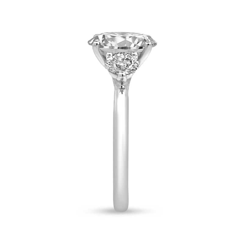 Oval Side Rounds Crossed Trilogy Diamond Engagement Ring view 4