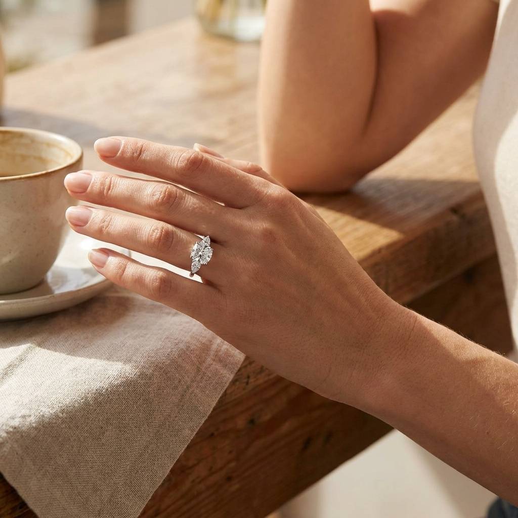 Cushion_Cut_Pear_Side_Trilogy_Lab_Grown_Diamond_Engagement_Ring_On_Hand