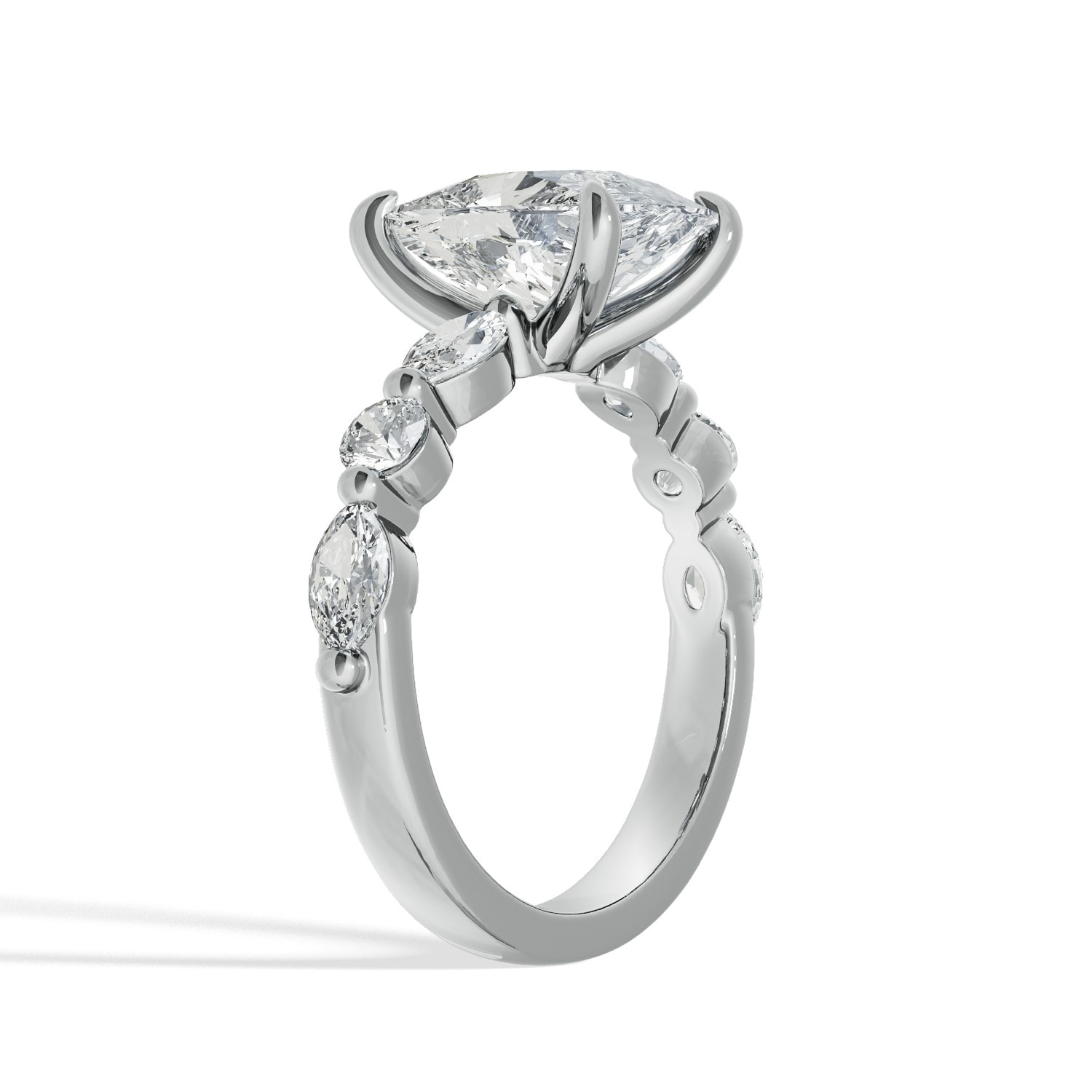 Elongated_Cushion-Cut_Diamond_Ring_with_Marquise_and_Round_Side_Diamonds_hero_platinum.jpg