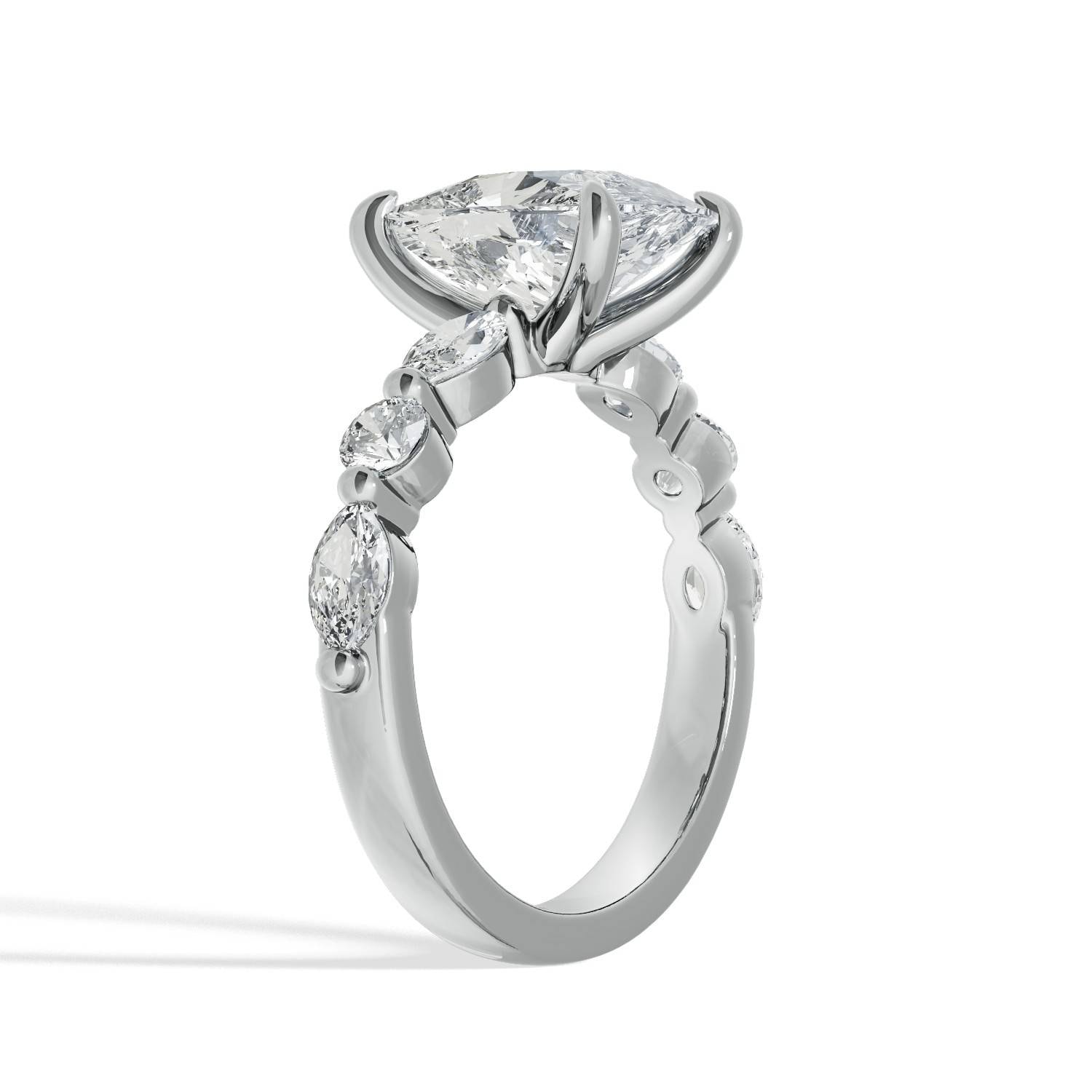 Elongated_Cushion-Cut_Diamond_Ring_with_Marquise_and_Round_Side_Diamonds_hero_platinum.jpg