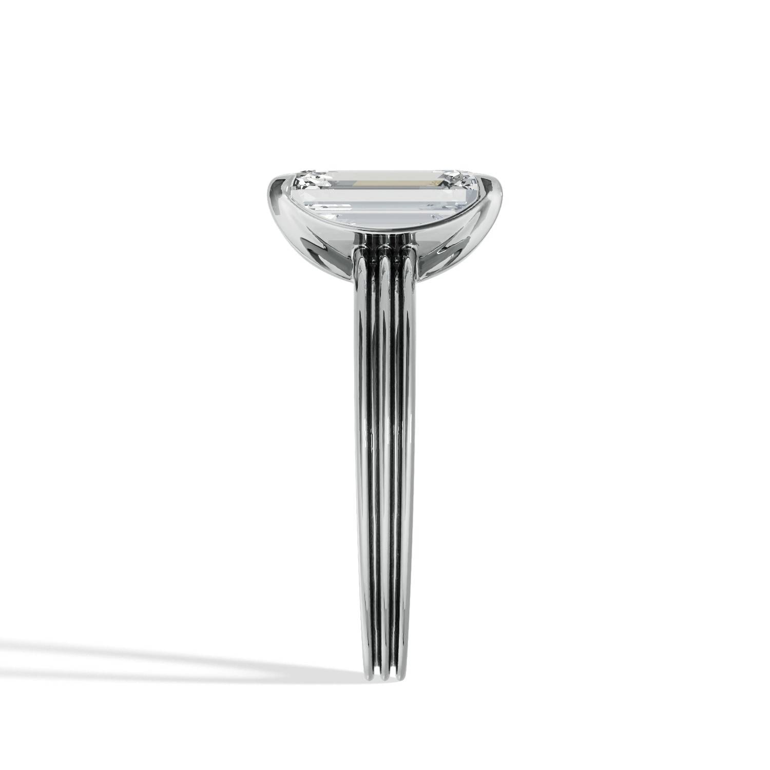 Emerald-Cut_Solitaire_Diamond_Engagement_Ring_with_Triple-Rail_Shank_side_view_platinum.jpg