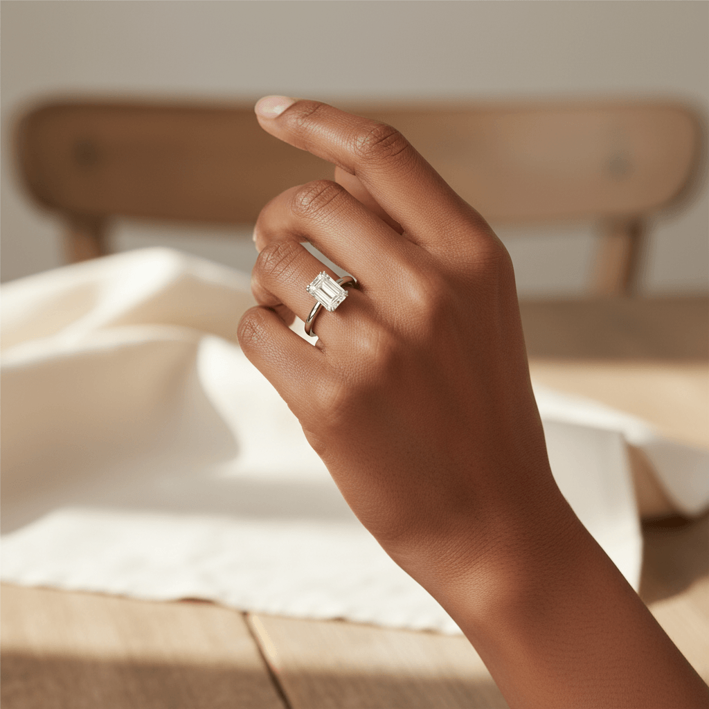 Emerald_Cut_Invisible_Gallery_Diamond_Engagement_Ring_On_Hand