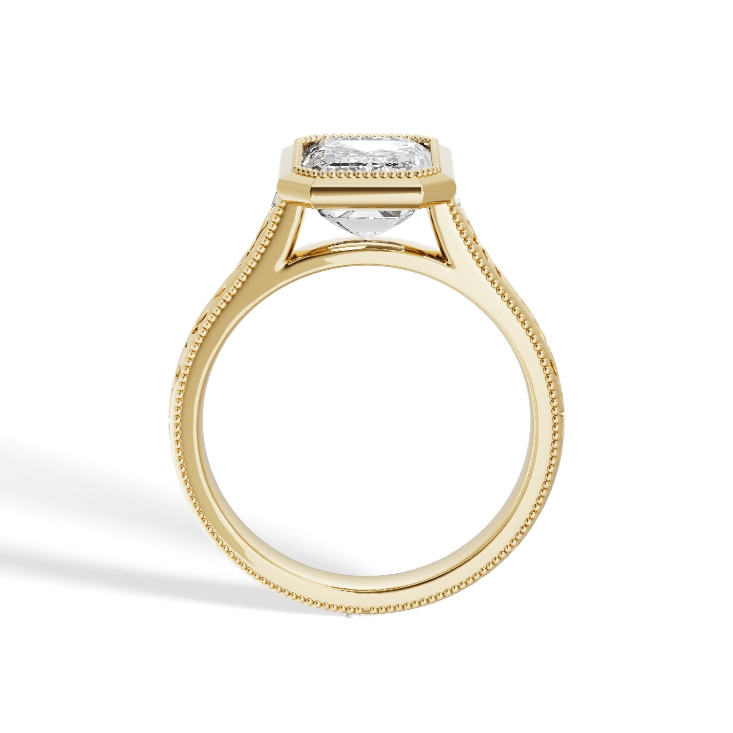 Engraved_Band_Emerald_Cut_Bazel_Setting_Diamond_Engagement_Ring_angle_view_yellow_gold.jpg