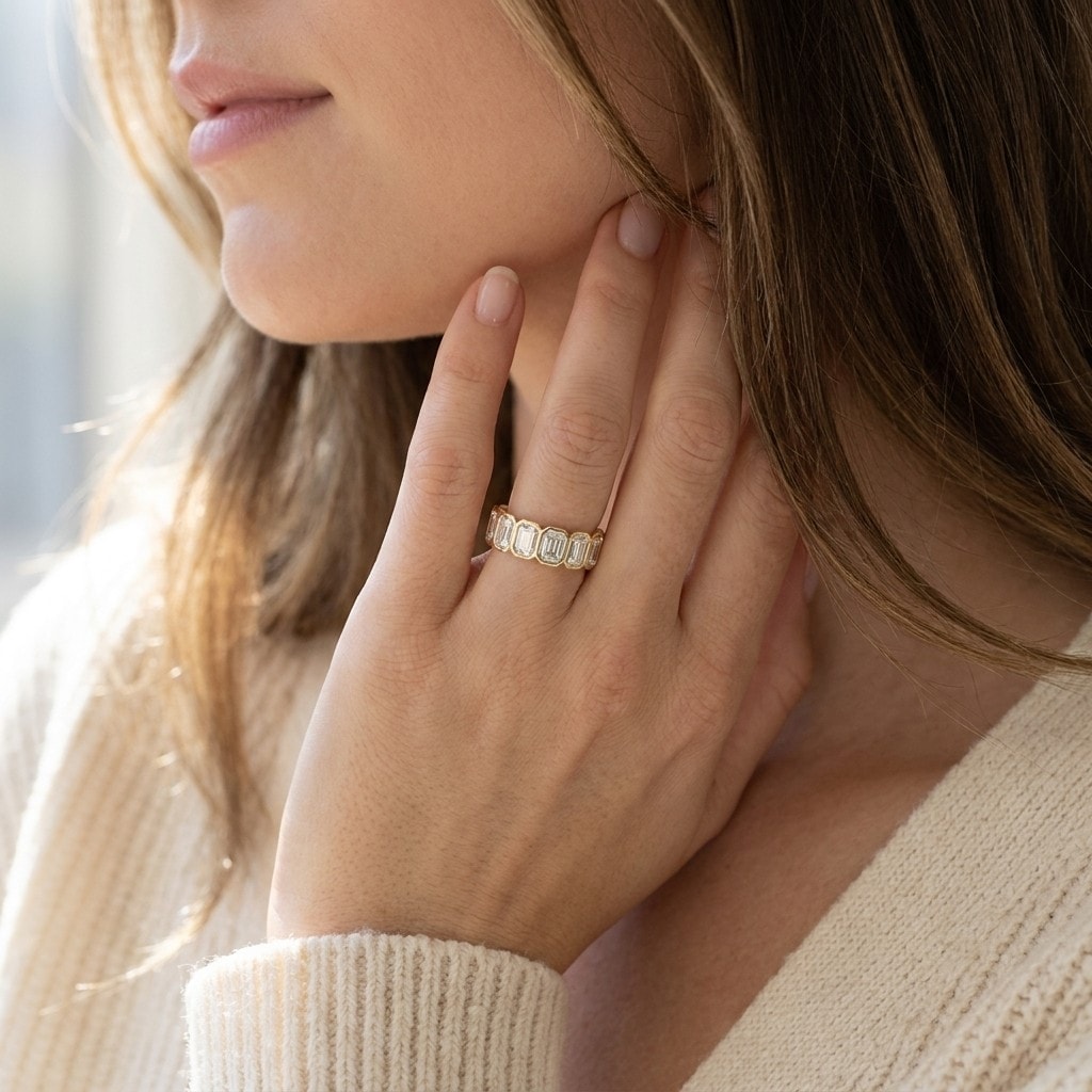 Full_Bezel-Set_Emerald-Cut_Diamond_Eternity_Ring_yellow_gold.jpg