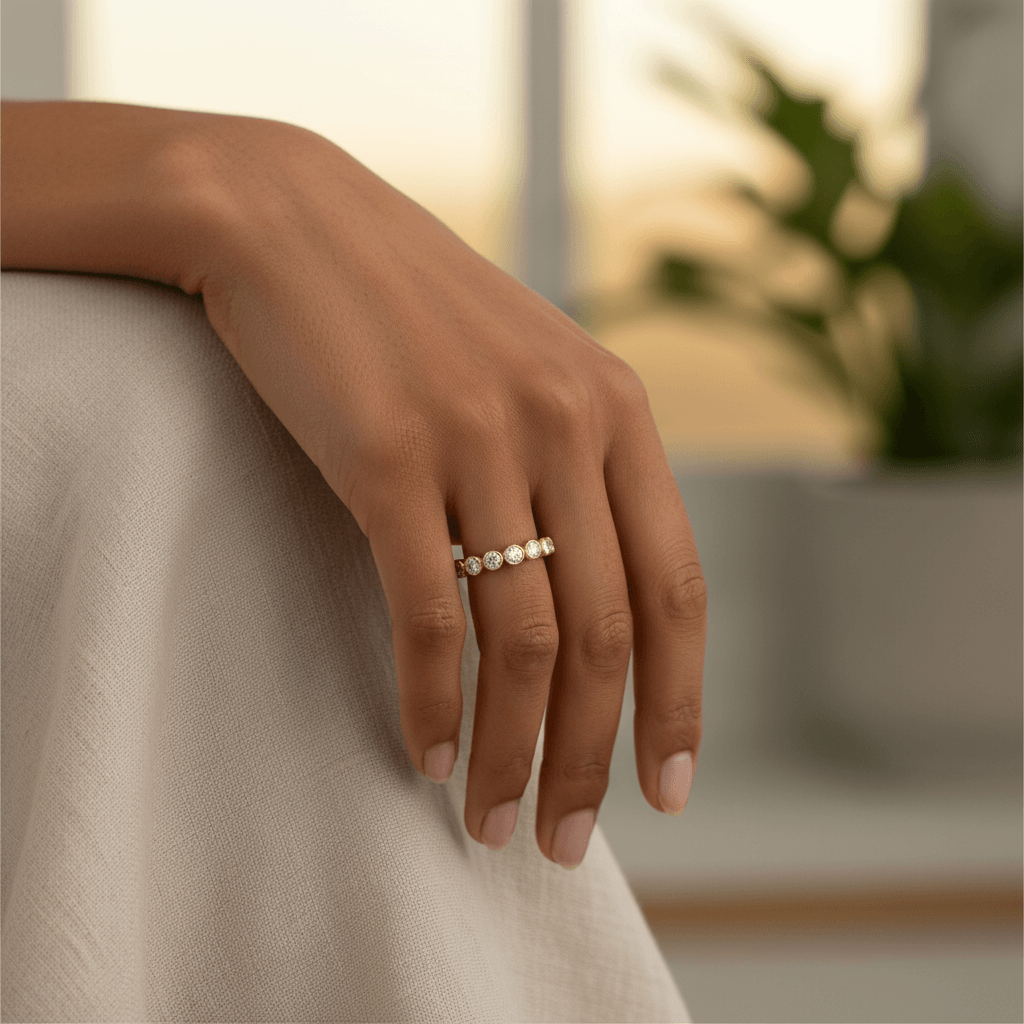 Half_Diamond_Wedding_Band_Bezel_Rubover_Setting_On_Hand