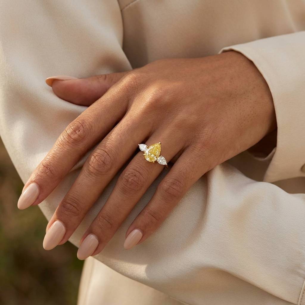 Lab-Grown Yellow Diamond Pear Trilogy Engagement Ring On Hand