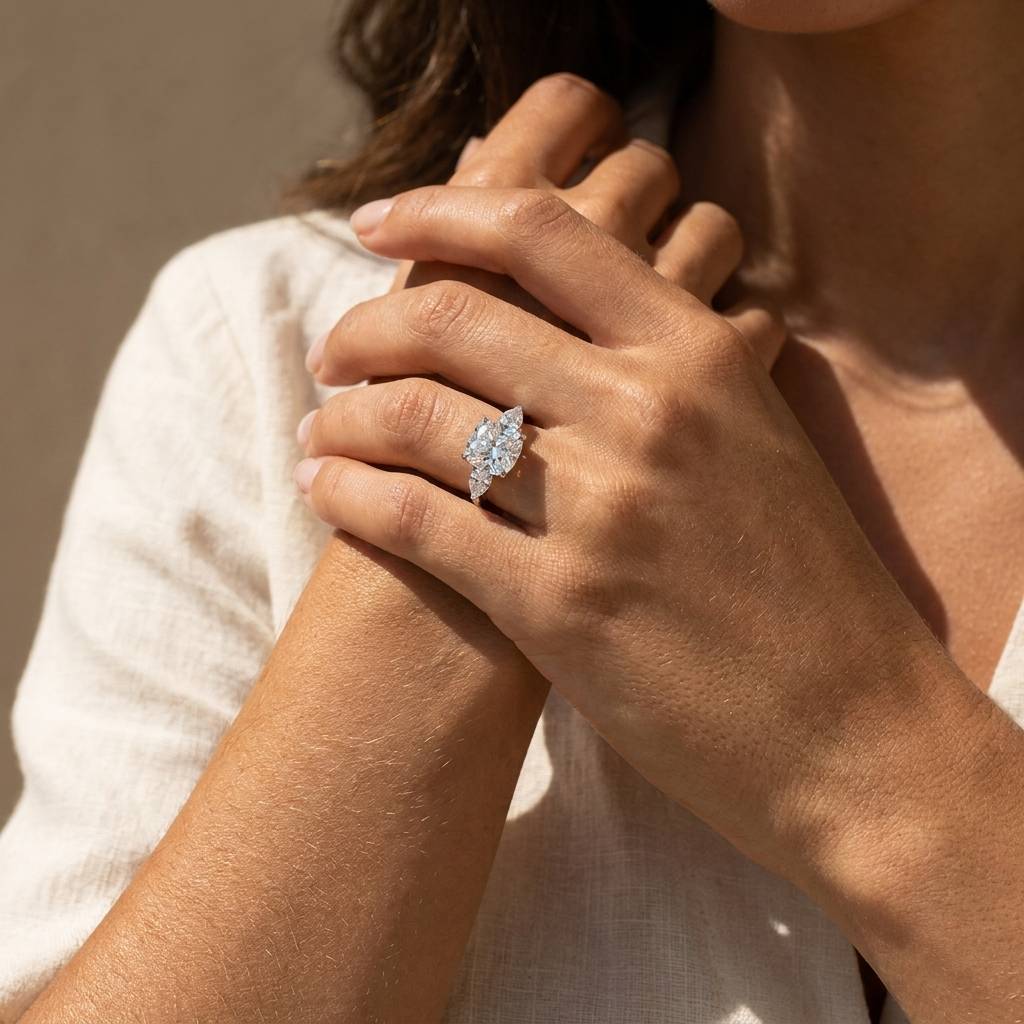 Large_Cushion_Shape_Pear_Side_Stones_Lab_Grown_Diamond_Engagement_Ring_On_Hand