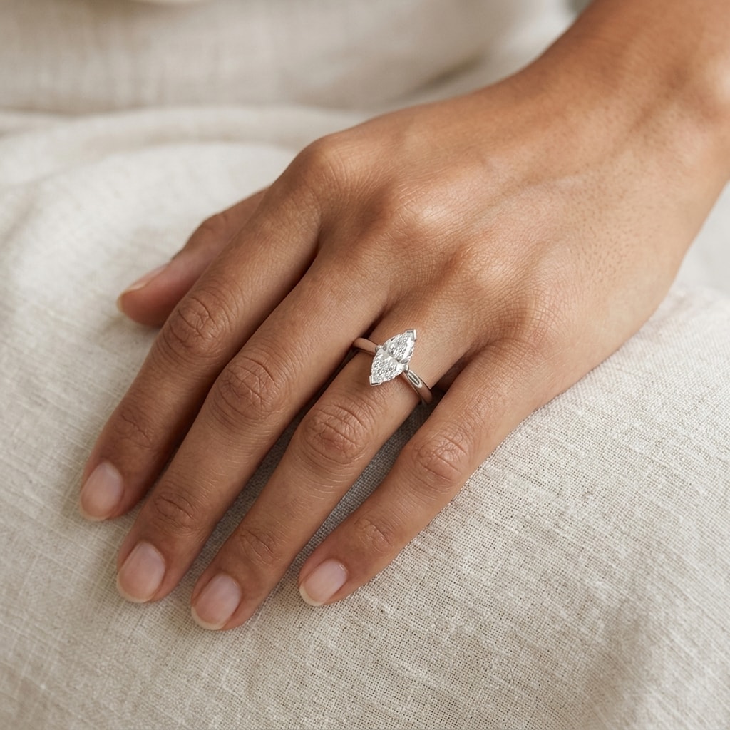 Plain_Marquise_Shape_Solitaire_Diamond_Engagement_Ring_On_Hand