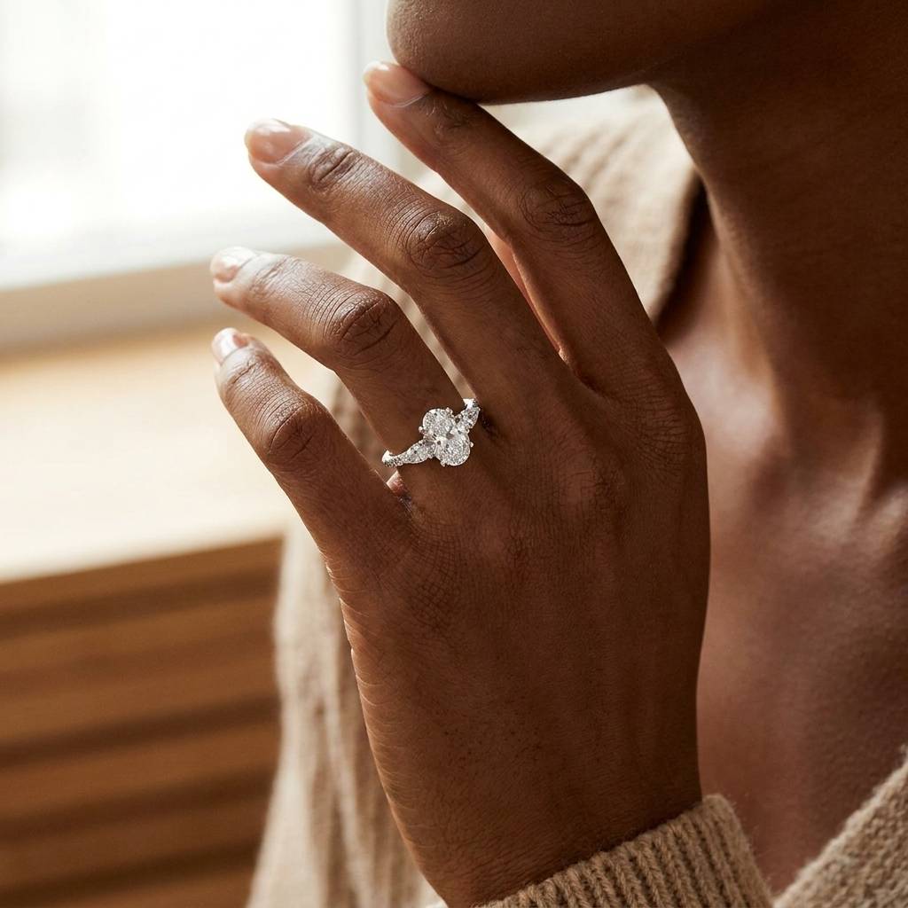 Oval_Shape_Pear_Side_Stones_Micro_Set_Diamond_Engagement_Ring_On_Hand