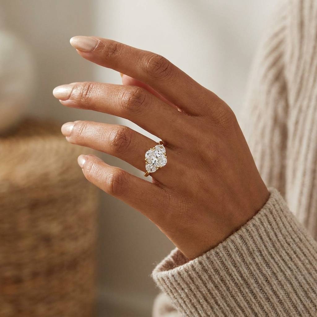 Oval Trilogy Half Moon Side Diamond Engagement Ring On Hand