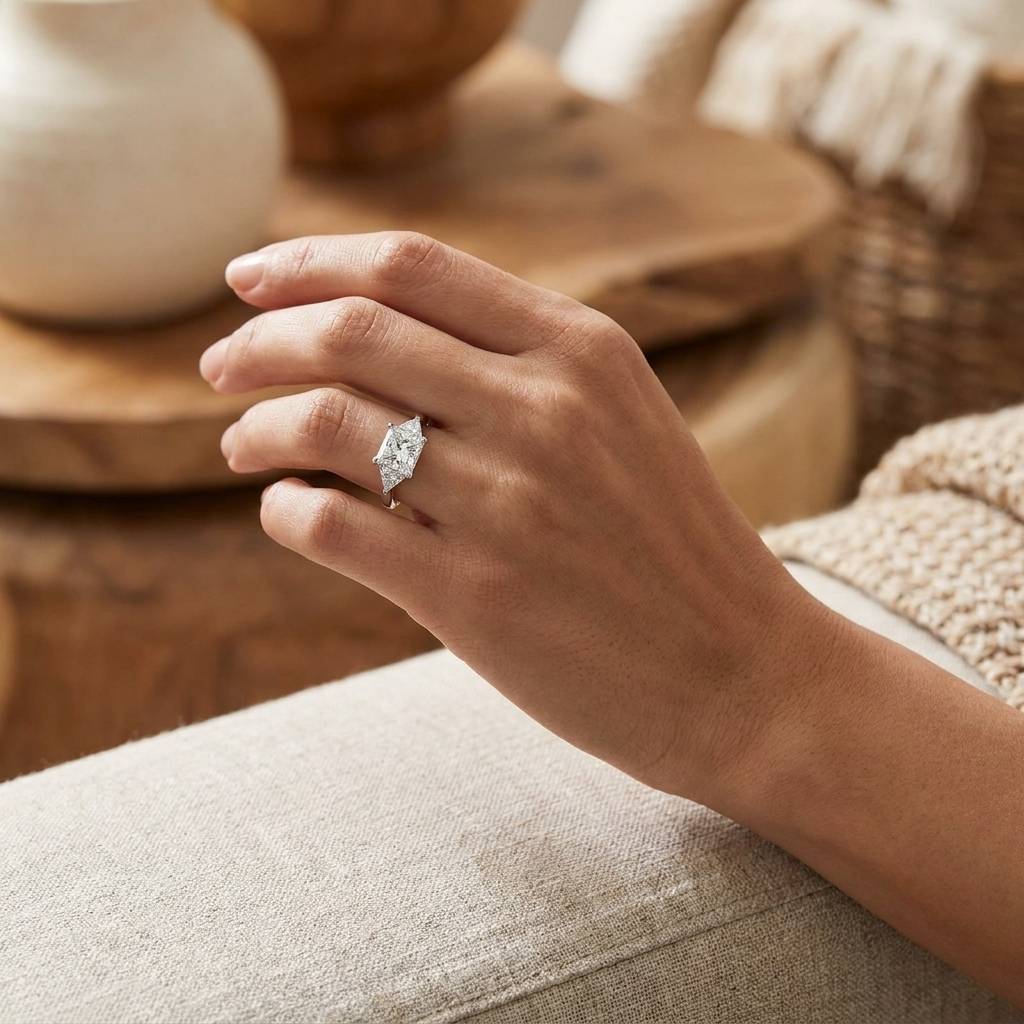 Princess_Shape_Trilliant_Side_Stones_Trilogy_Engagement_Ring_On_Hand