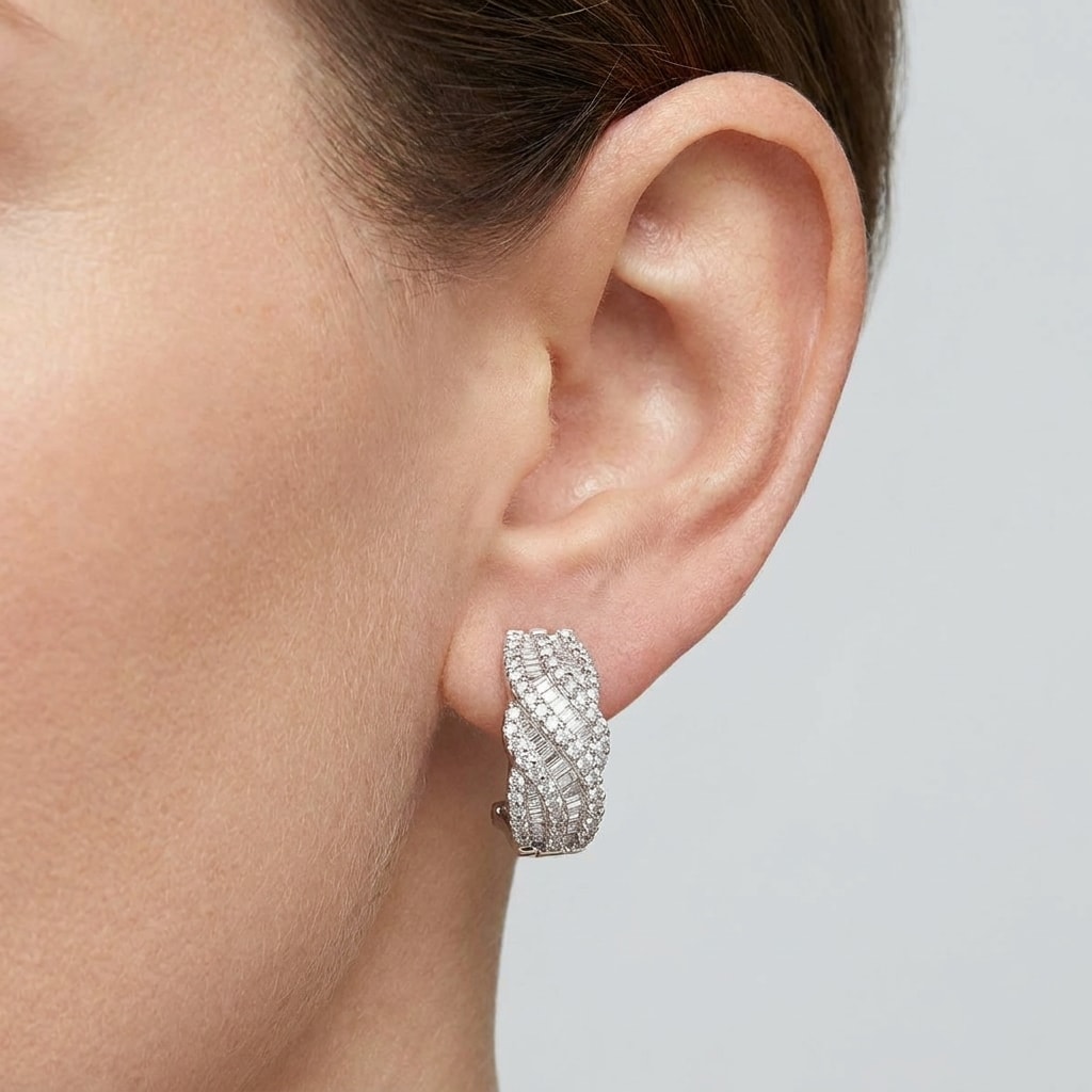 Round_And_Baguette_Cut_Cross_Over_Diamond_Hoops_Earrings_On_Model
