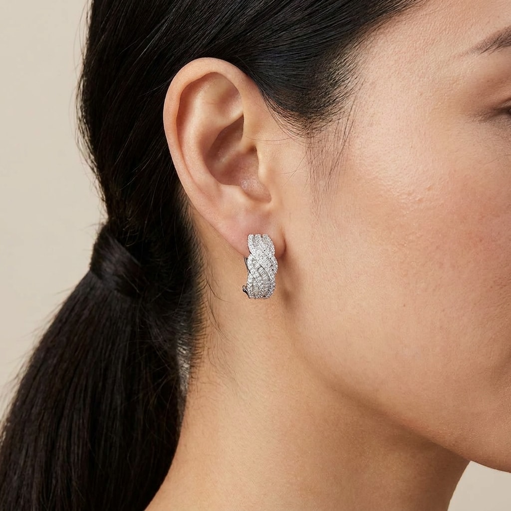 Round_And_Baguette_Cut_Cross_Over_Diamond_Hoops_Earrings_On_Model_2