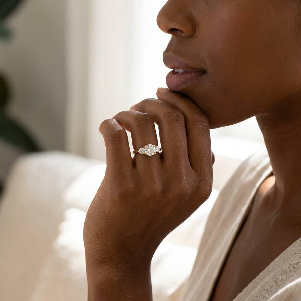 Round_Shape_Lab_Grown_Diamond_Trilogy_Engagement_Ring_On_Model