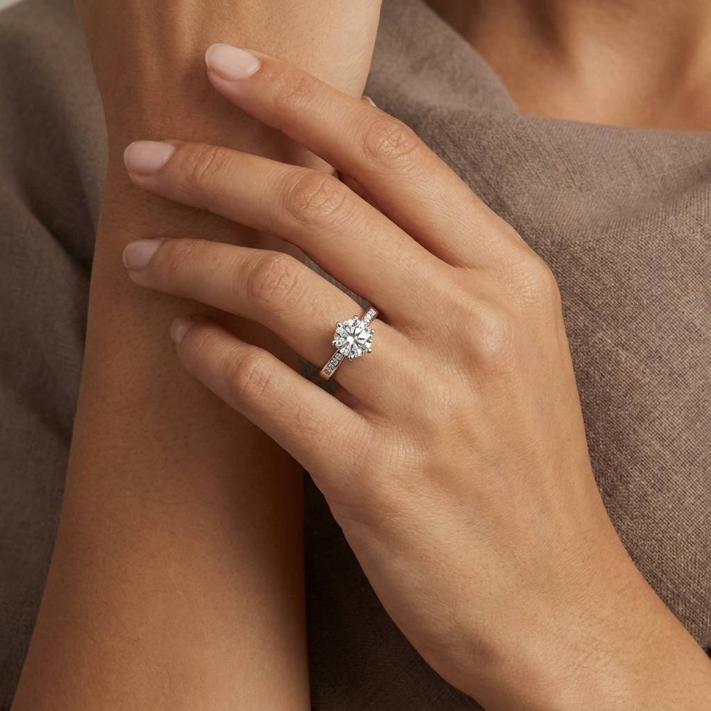 Six_Claw_Pave_Set_Collet_Round_Shape_Lab_Grown_Diamond_Engagement_Ring_On_Hand