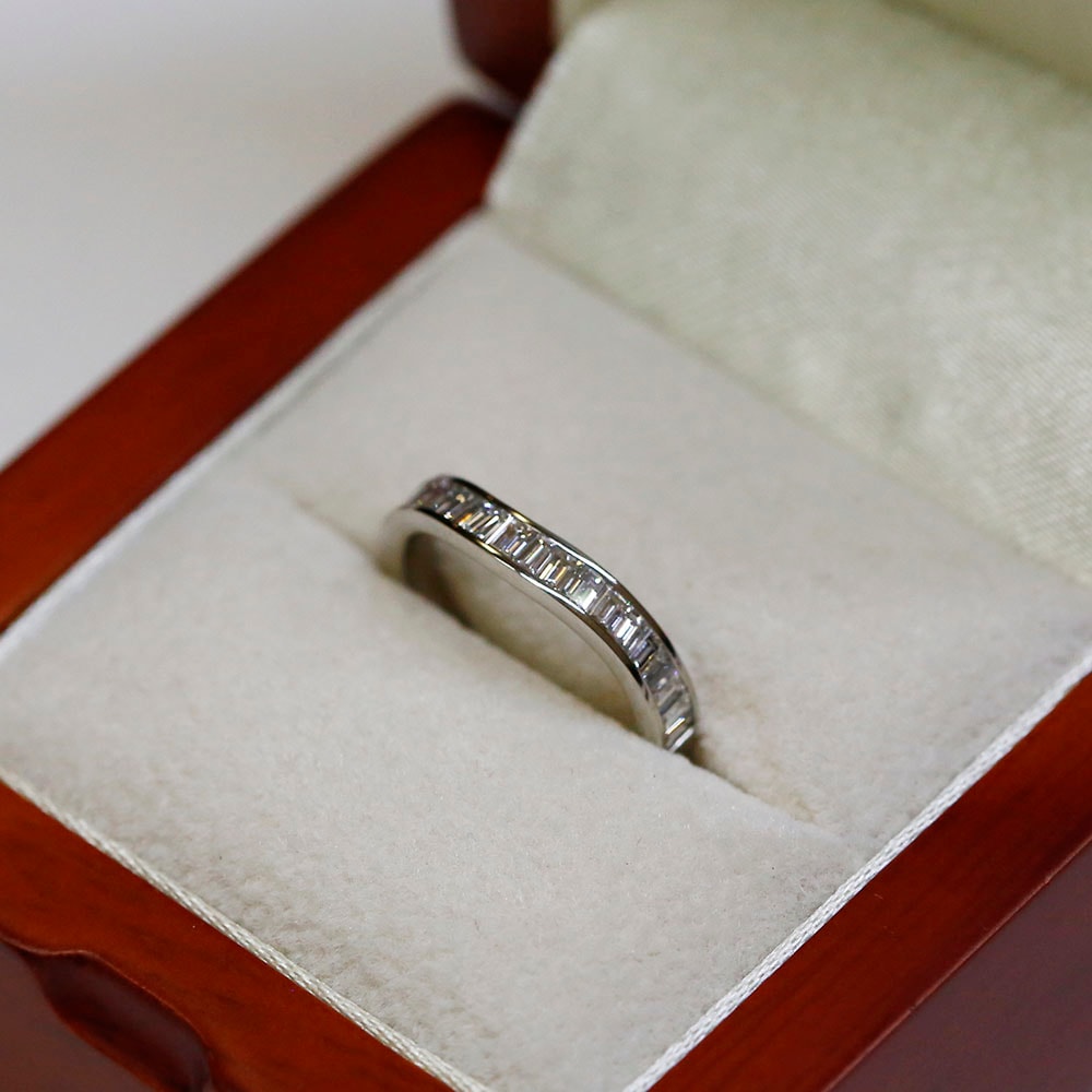 Channel Setting 0.55ct Curved Baguette Cut Diamond Wedding Ring in a Box