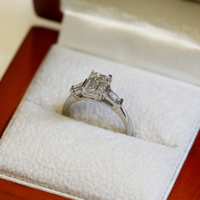 Emerald Cut and Tapered Baguettes Diamond Engagement Ring in a Box