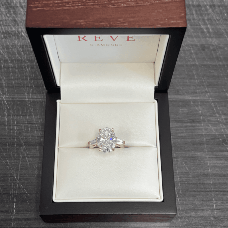 Oval Trilogy Tapered Baguette Channel Set Diamond Engagement Ring view 7