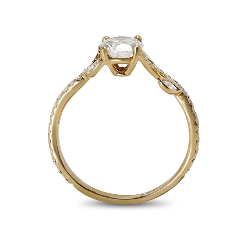 Four Claw Round Cut with Four Small Marquise Cut Diamonds on the Band Engagement Ring