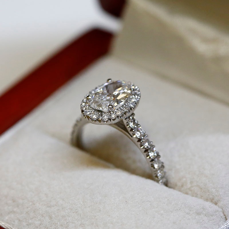 Oval Cut Micro Setting Diamond Halo Engagement Ring in box