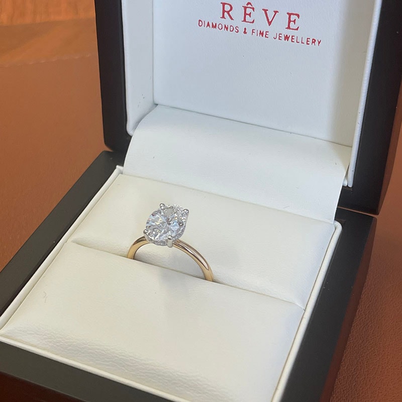 Hailey Bieber Oval Hidden Halo Solitaire Diamond Engagement Ring view 5