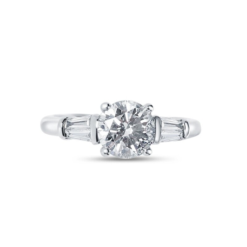 Round Shape And Tapered Baguettes Diamond Engagement Ring view 1