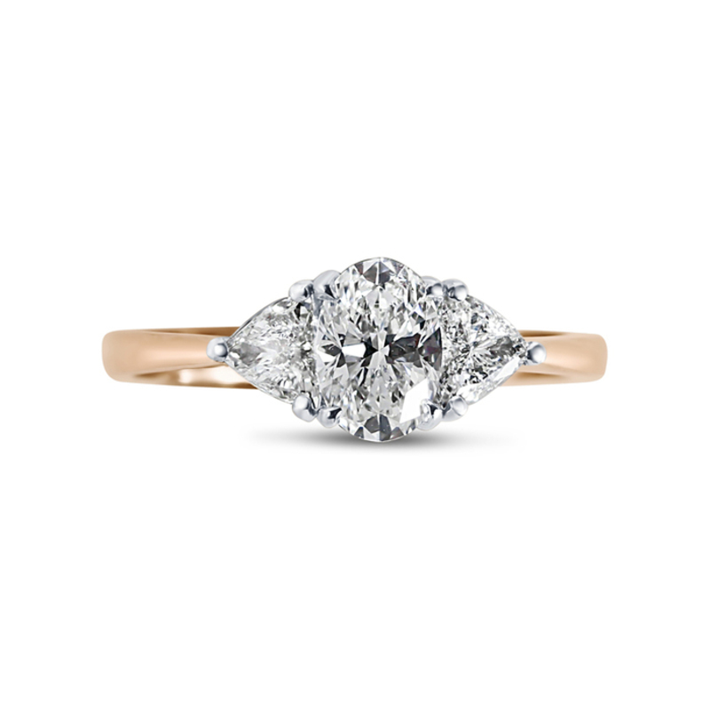Oval Cut Side Trilliant Diamond Engagement Ring