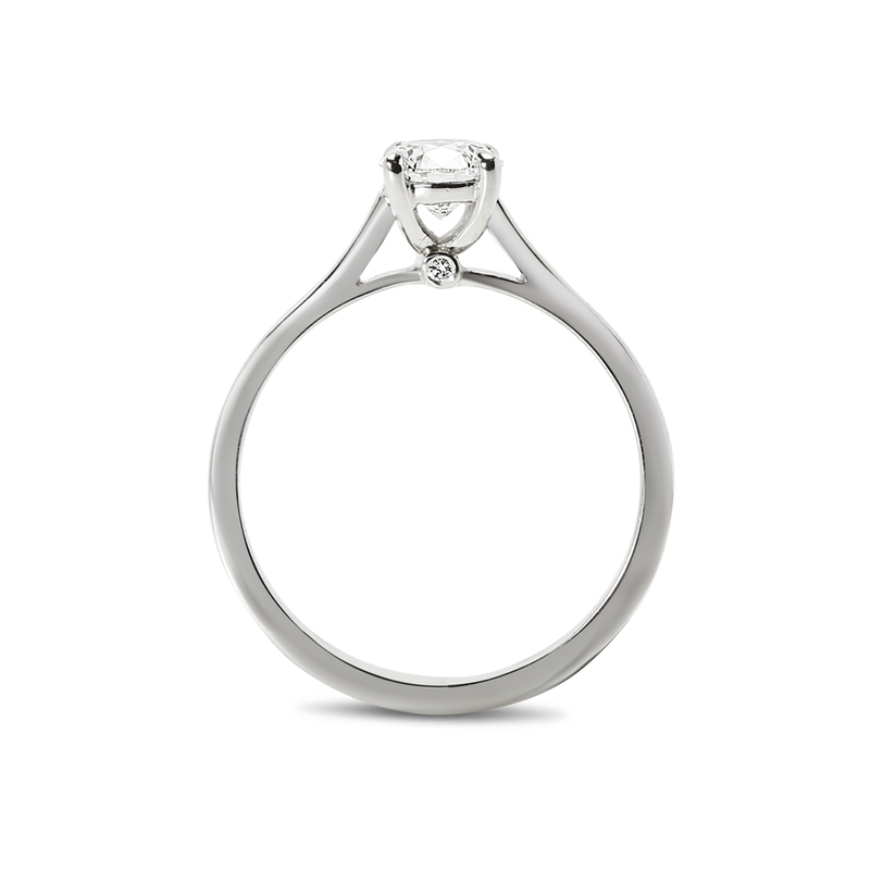 Solitaire Ring with Small Round Diamond Below the Center Stone