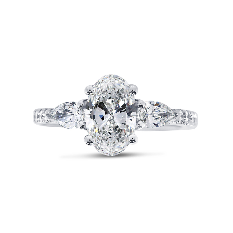 Oval Shape Pear Side Stones Micro Set Diamond Engagement Ring