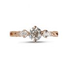 Rose gold round and pear shapes diamond ring top view