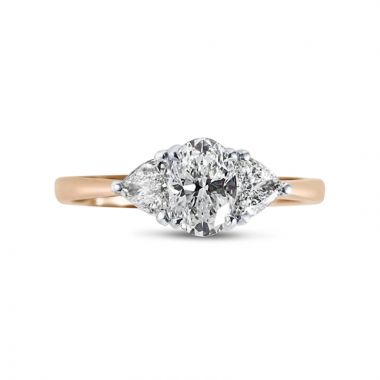 Oval Cut Side Trilliant Diamond Engagement Ring Side View