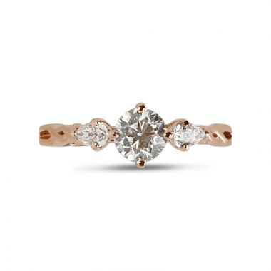 Rose gold round and pear shapes diamond ring top view