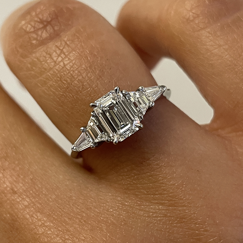 Emerald Cut Trapezoid and Bullets Side Diamond Engagement Ring