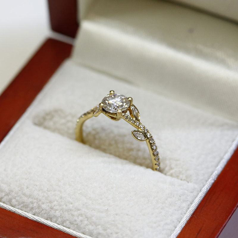 Four Marquise Band Round Diamond Engagement Ring