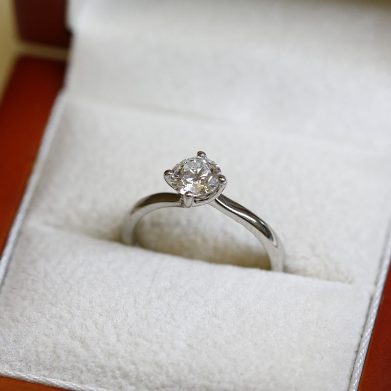 Twist Round Diamond Solitaire Engagement Ring