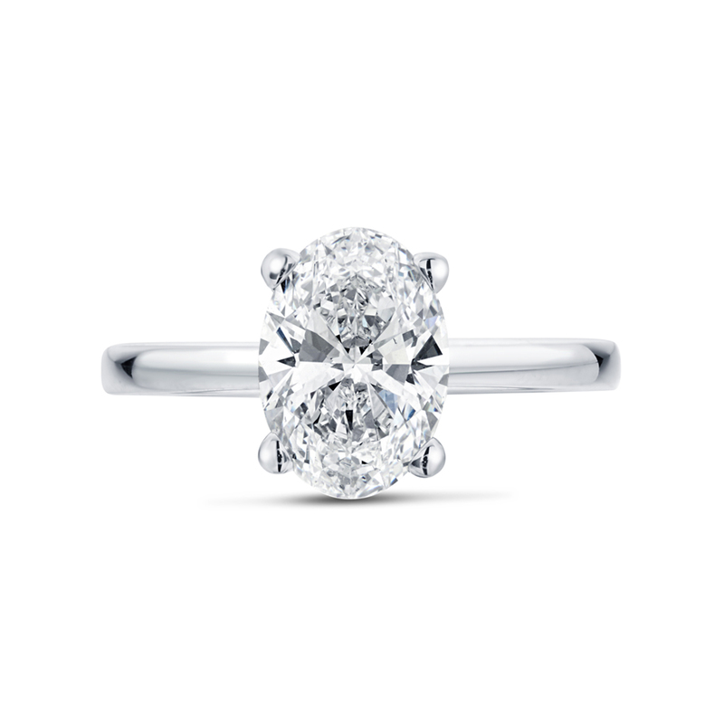 Four Claw Floating Round Cut Solitaire Diamond Engagement Ring Top View