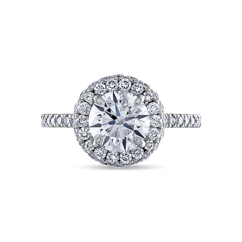 Cushion setting for clearance round diamond