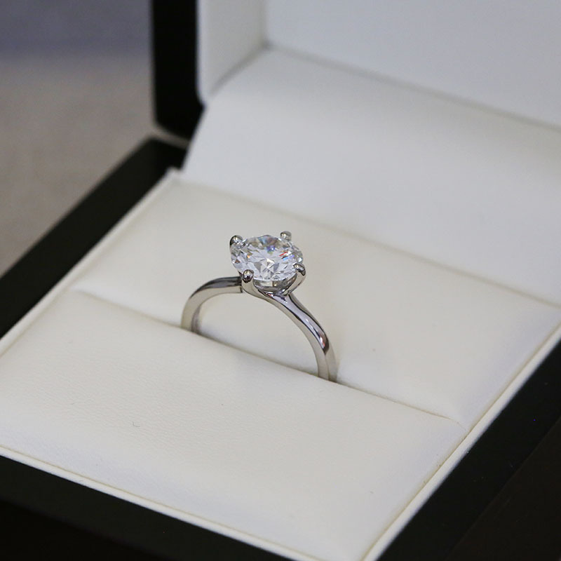 North East South West Round Diamond Solitaire Engagement Ring