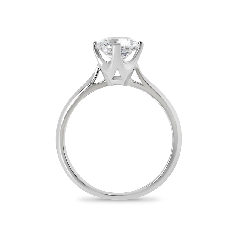 Four Claw Solitaire North East South West Tapered Engagement Ring