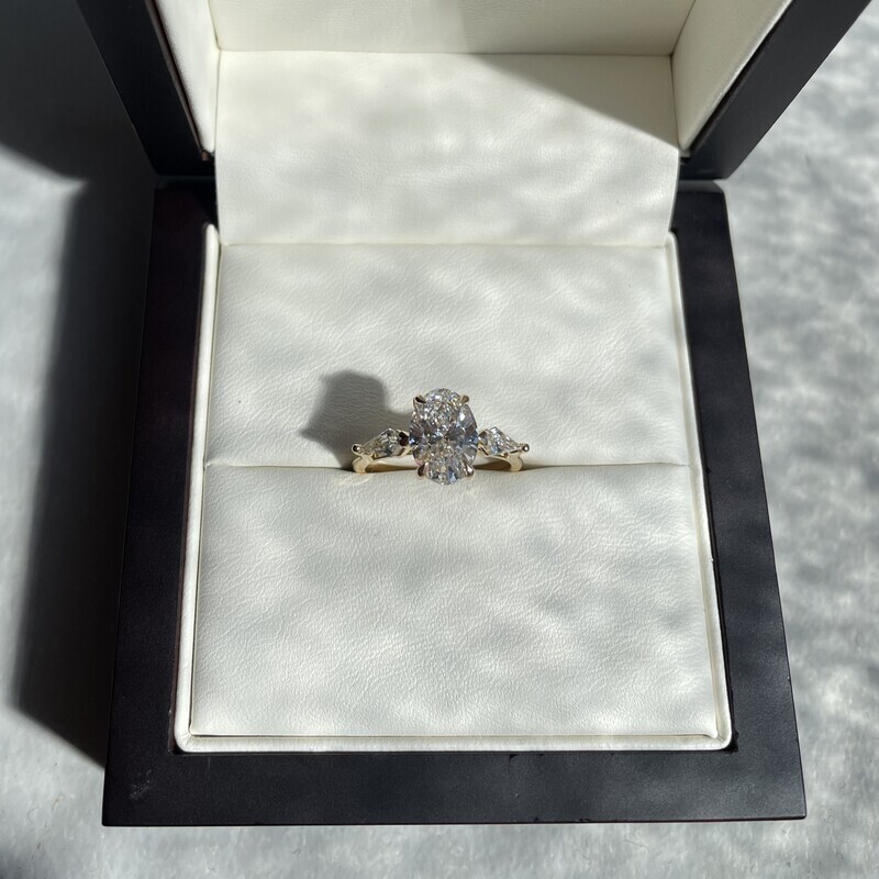 Oval and Kite side stones Diamond Engagement Ring