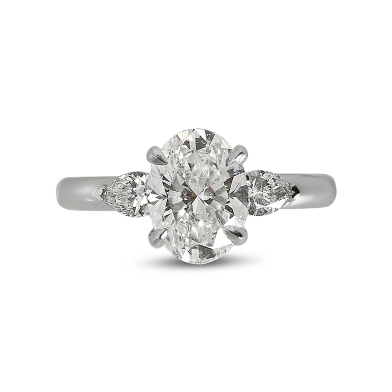 Oval and Pear Side Stones Diamond Engagement Ring