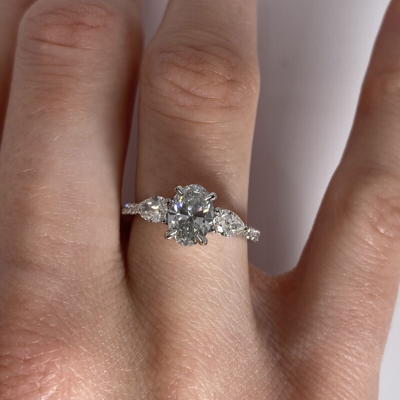 Oval with pear side stones on sale