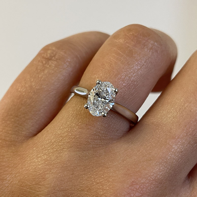 Floating oval diamond engagement ring store