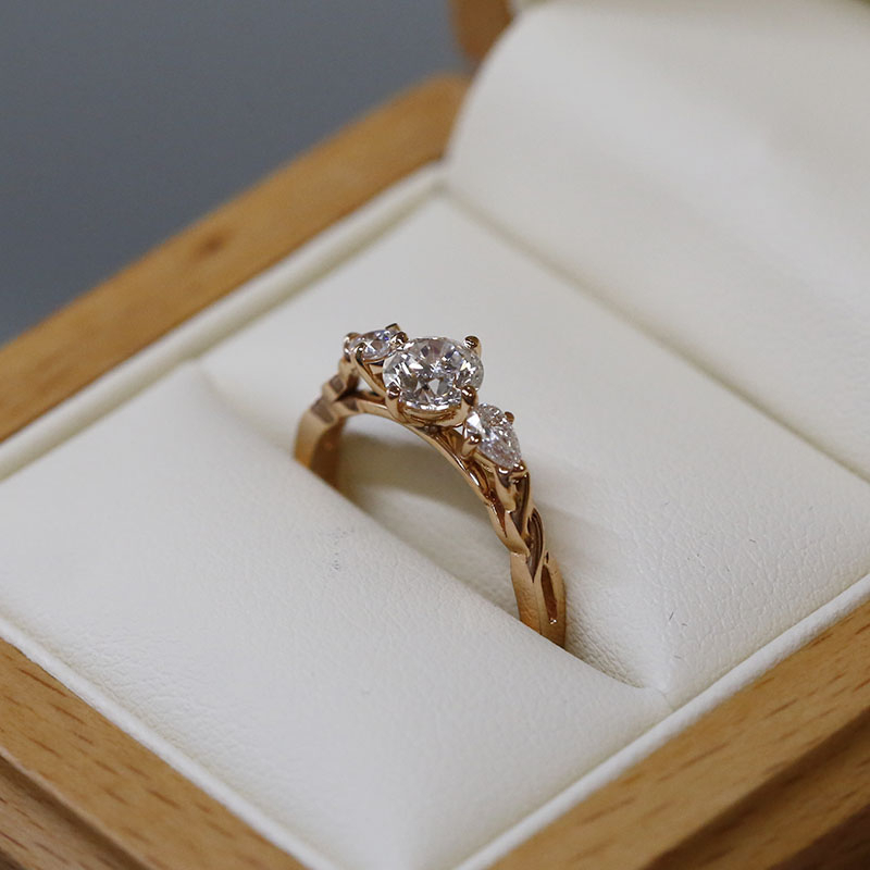 Rose Gold Round Shape Pear Side Stones Diamond Engagement Ring