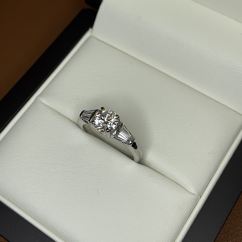 Round and Tapered Baguettes Diamond Engagement Ring